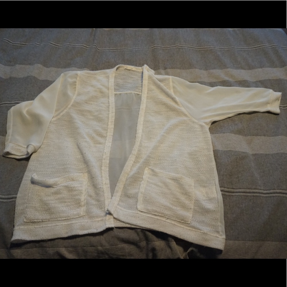 Urban Outfitters light cream sweater
